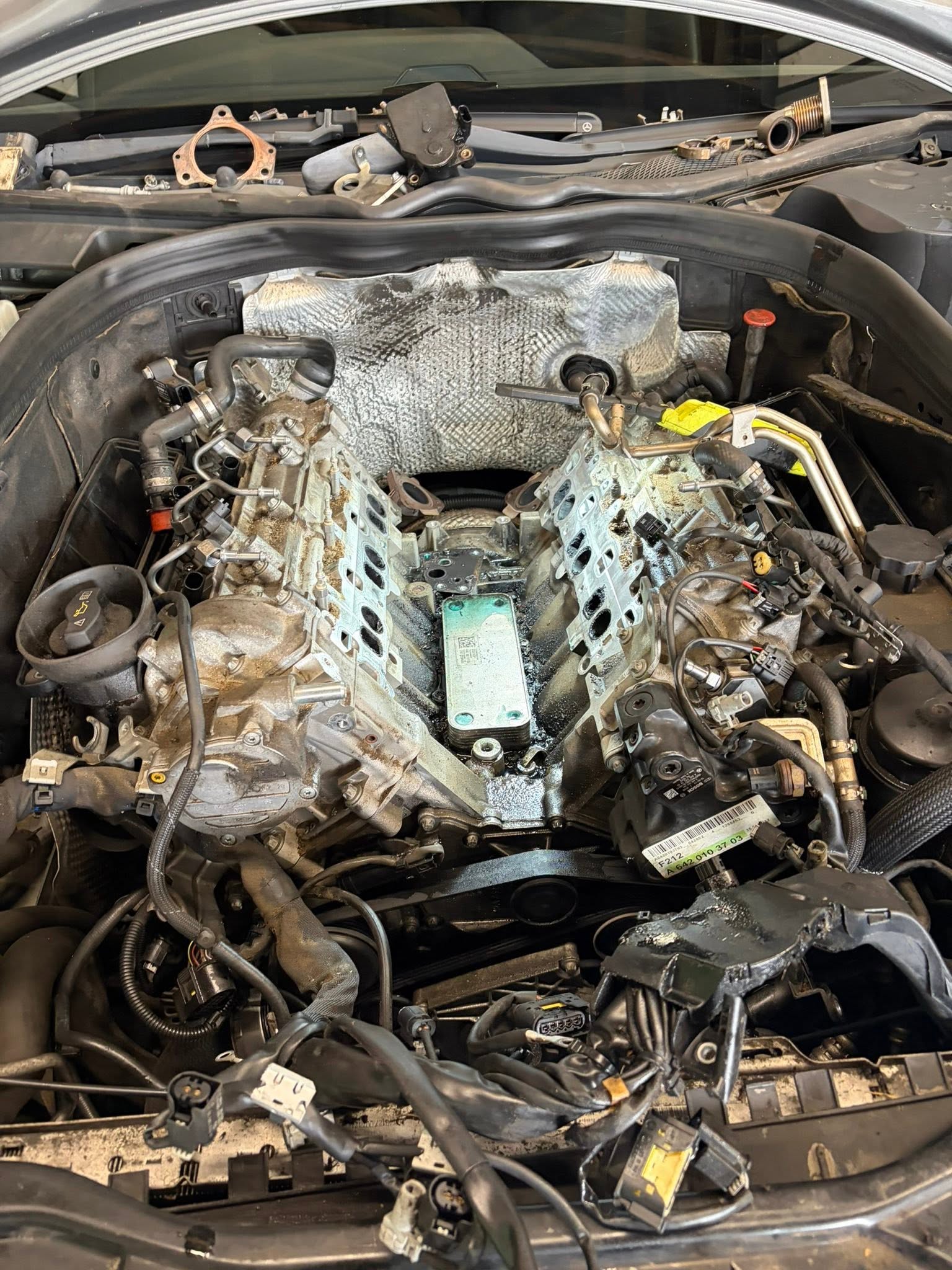 A V-engine with the top end stripped down during a major repair